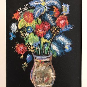 Blue ferns in ceramic vase